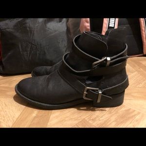 Black cutout buckle boots